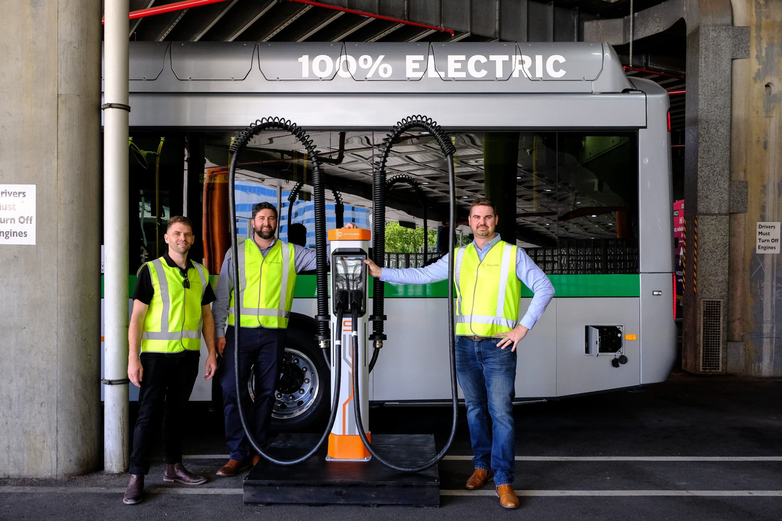 ev charger in front of electric bus